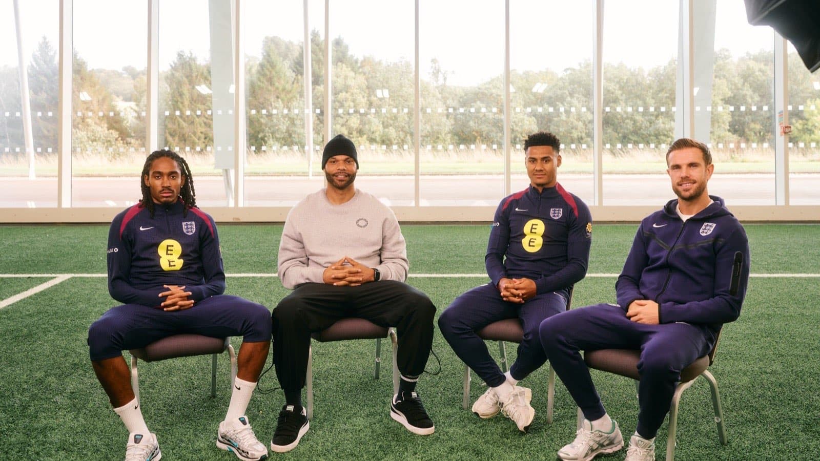 Djed Spence, Joleon Lescott, Ollie Watkins and Jordan Henderson on the E.ON Next Memories of Grassroots panel, reflecting on their grassroots football beginnings